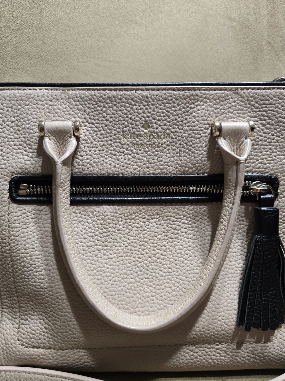 Kate Spade Cream Pebbled Leather Satchel with Black Trim